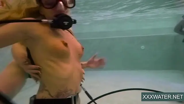 Hot chicks with a guy in the pool